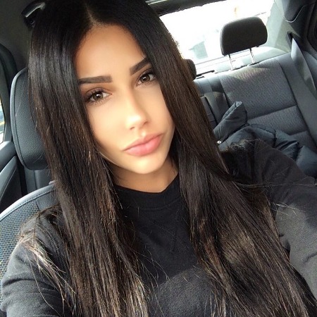 Sheniz Halil in a car.